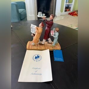 Norman Rockwell Figurine Group with Yellow Base and Blue Tag